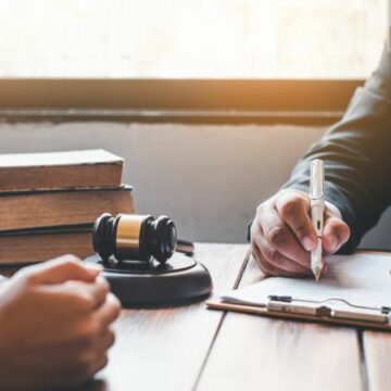 A contract signing in a barrister's office.