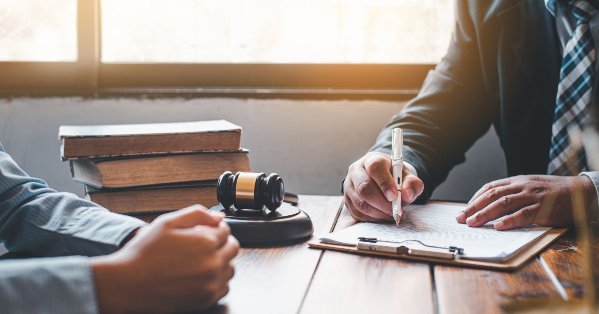 A contract signing in a barrister's office.