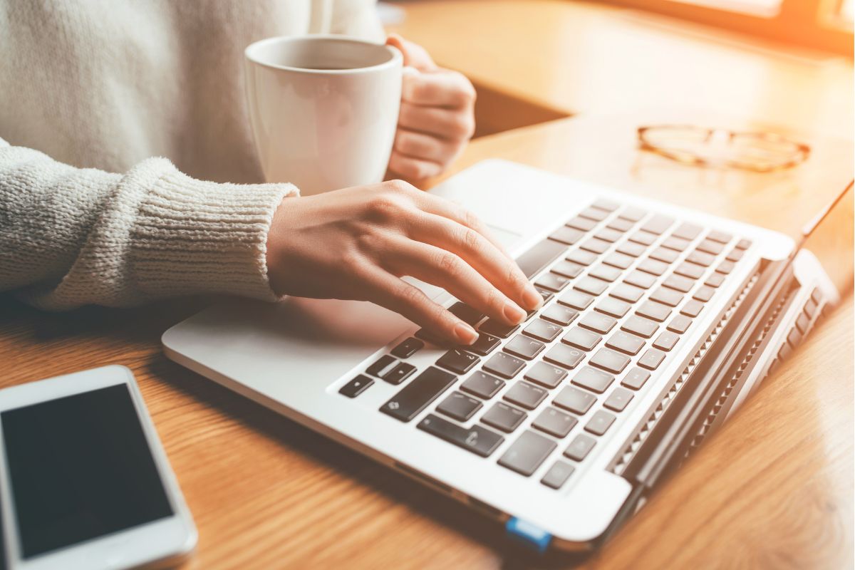 A woman searching on the internet to help illustrate the struggles of choosing a direct access barrister.